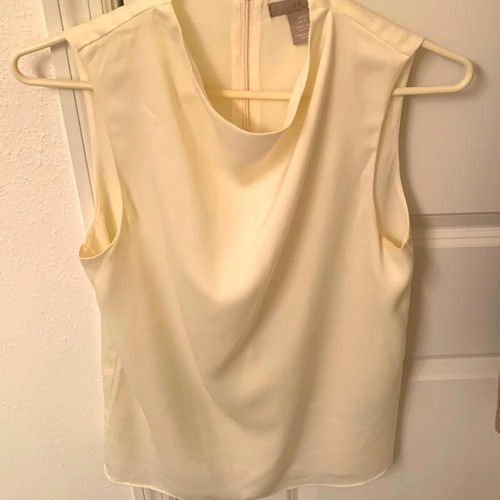 Gently used cream colored blouse.